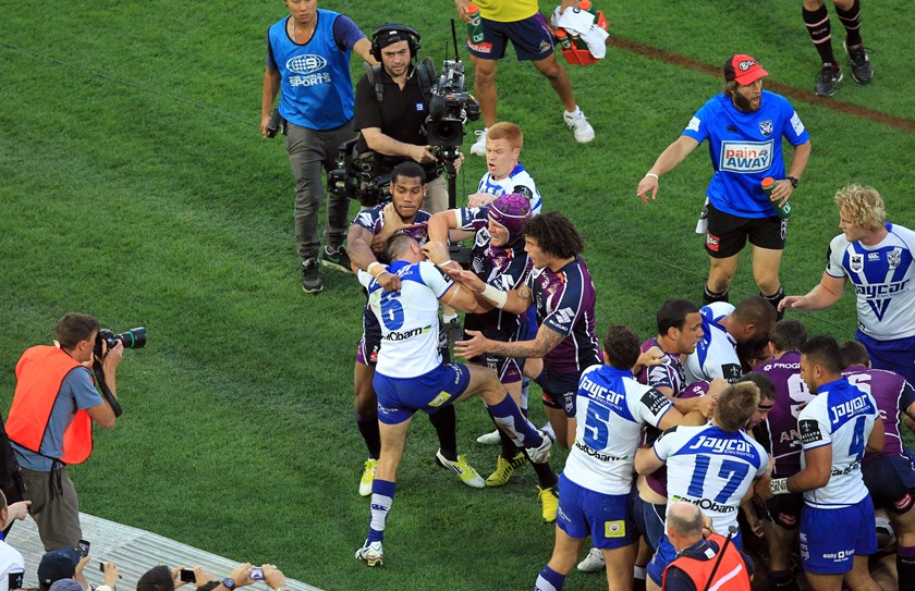 Melbourne and Canterbury players clash during the 2012 grand final.