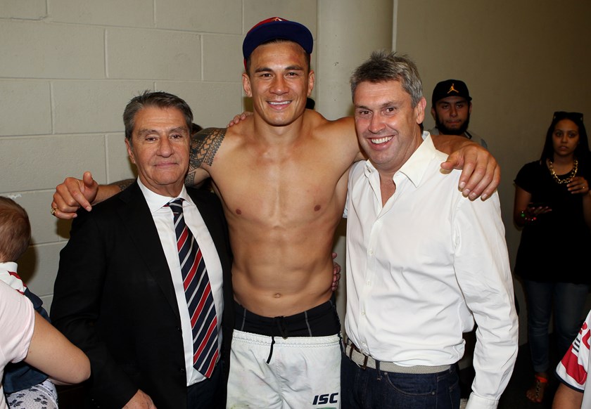 Nick Politis with star forward Sonny Bill Williams and Roosters director David Gyngell after the 2013 grand final.