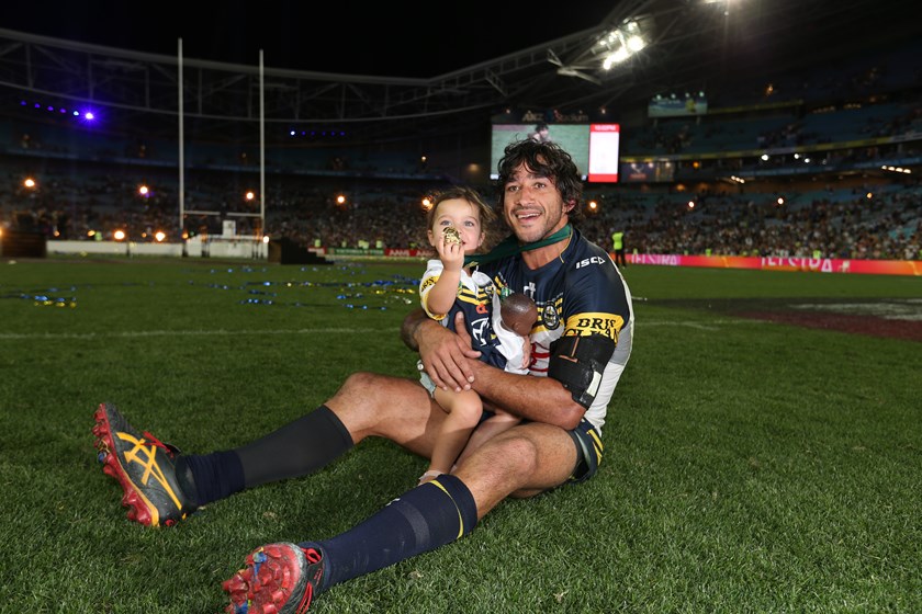 Johnathan Thurston and daughter Frankie after the 2015 grand final.