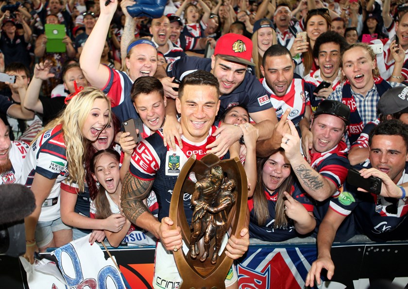 Sonny Bill Williams celebrates the Roosters' 2013 grand final win with fans.