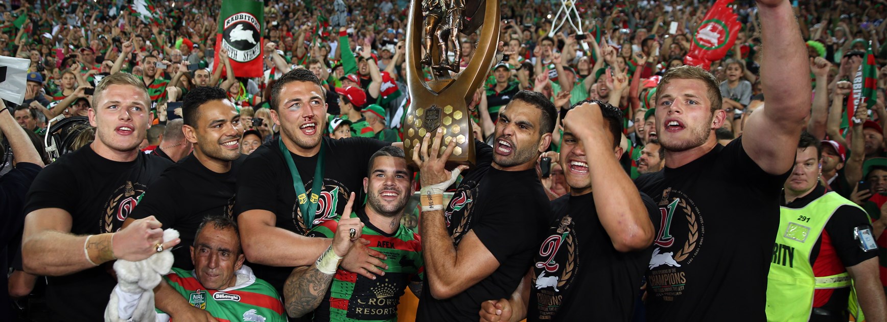 Rabbitohs players celebrate the title.