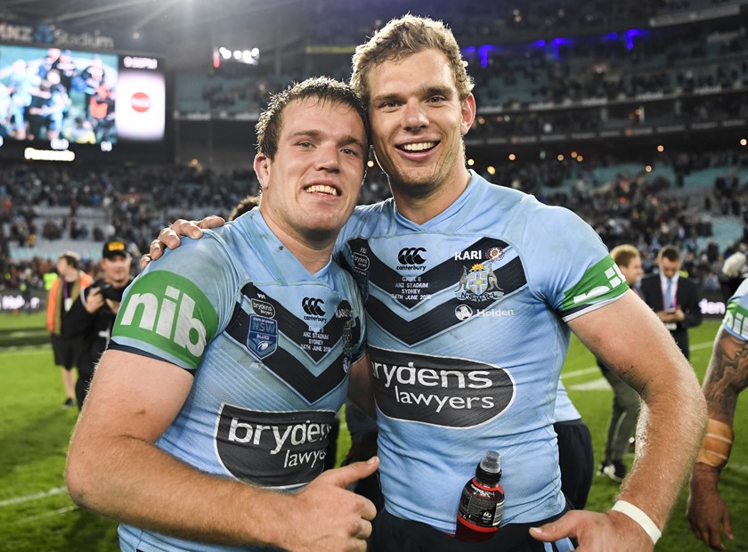 Jake and Tom Trbojevic celebrate the Blues win in Game Two in 2018.