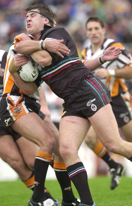 Former Panthers, Cronulla and Queensland prop Martin Lang was coached by his father John.