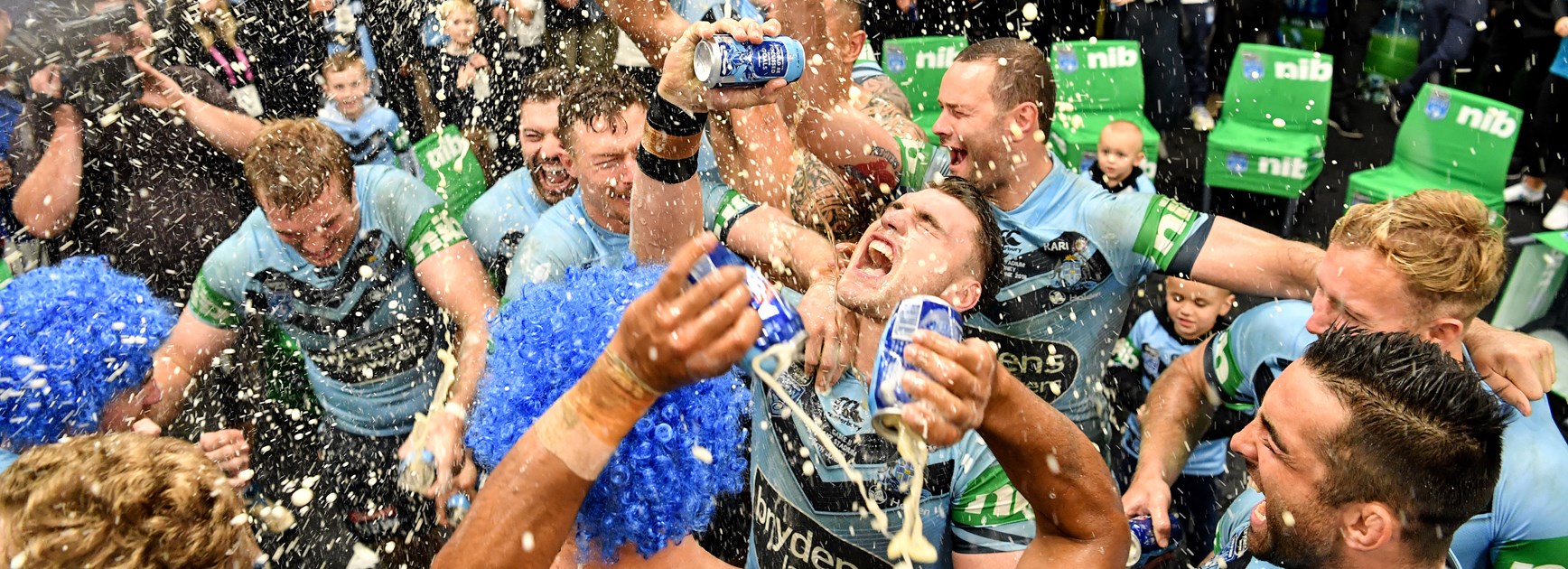 NSW Blues players celebrate their series win.