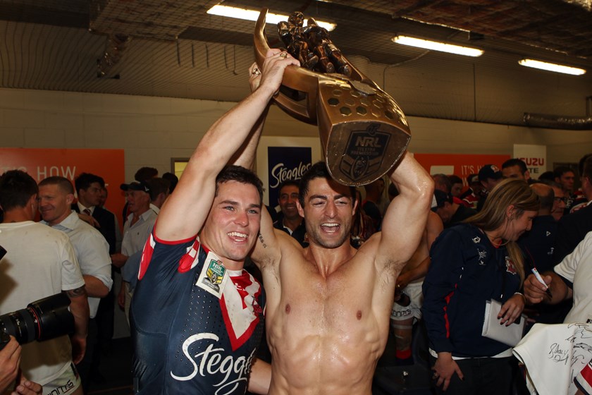 Daniel Mortimer with Roosters captain Anthony Minichiello after the 2013 grand final.