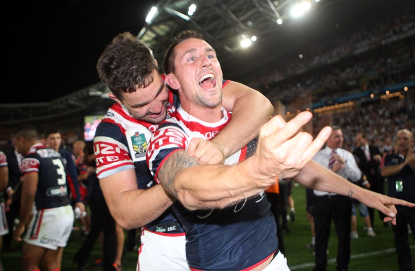 Mitchell Pearce celebrates the Roosters' 2013 grand final win.