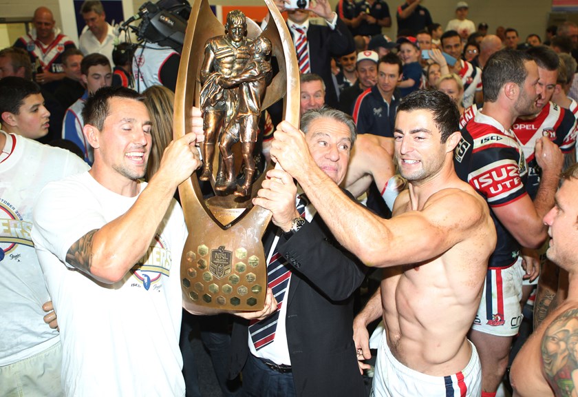Nick Politis with Mitchell Pearce and Anthony Minichiello after the 2013 grand final.
