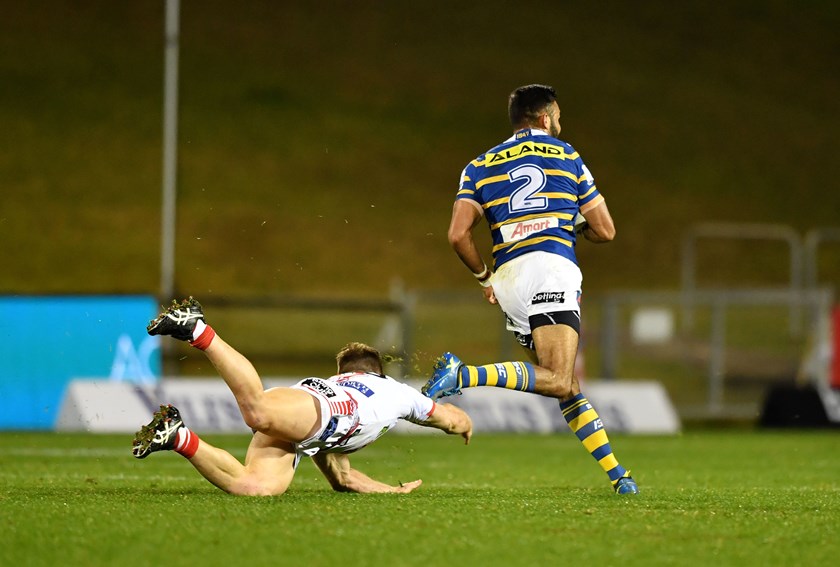 Eels winger Bevan French on the way to the tryline.