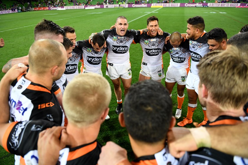 Tigers captain Russell Packer leads celebrations after beating the Storm.