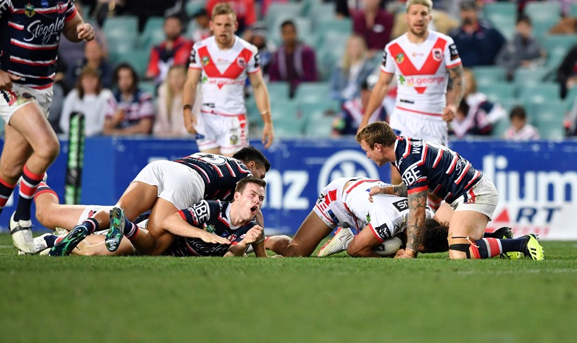 Luke Keary shows the pain after suffering his knee injury.