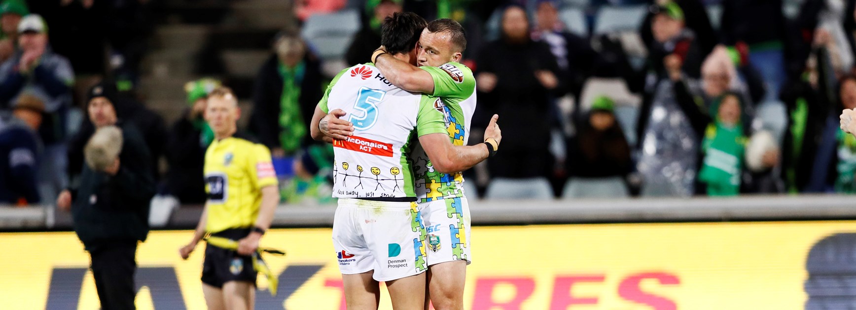 Josh Hodgson and Jordan Rapana celebrate the win over the Roosters.