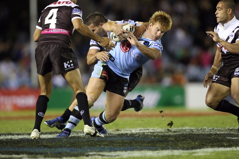 Lance Thompson hits the ball up in his last NRL match in 2008.