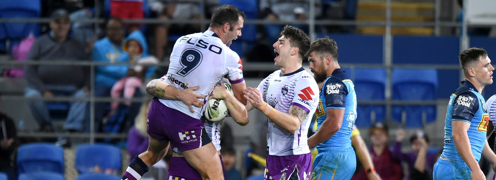 The Storm celebrate Cameron Munster's try against the Titans.