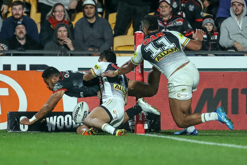 Warriors winger David Fusitu'a comes down to earth after scoring a try.