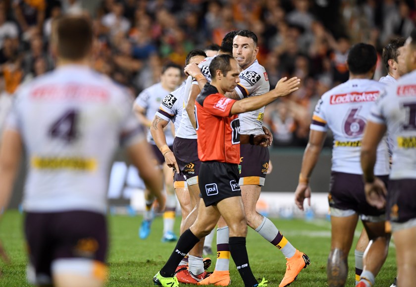 Referee Ashley Klein awards the Broncos the controversial penalty in golden point.