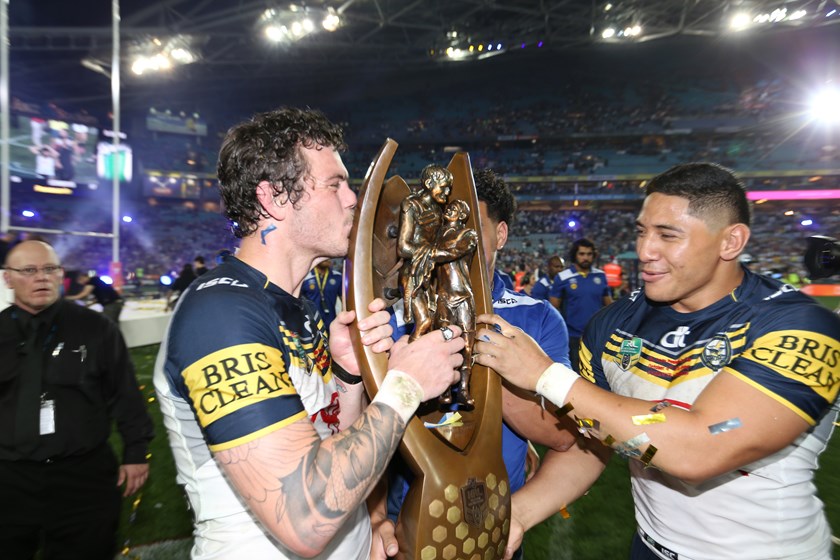 Ethan Lowe and Jason Taumalolo after the Cowboys win the 2015 grand final.