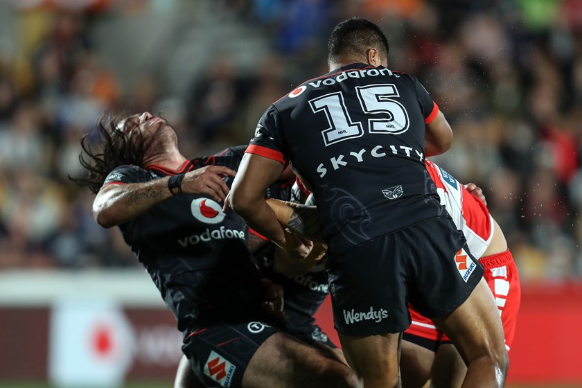 Warriors back-rower Tohu Harris reels out of the tackle that ended his night against the Dragons.