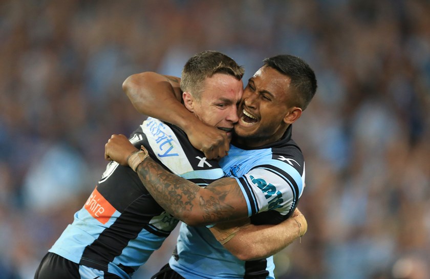 Ben Barba and fellow former Shark James Maloney embrace after the 2016 grand final.