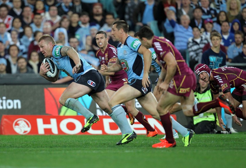 Luke Lewis on the run for the Blues.