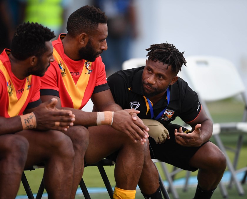 Papua New Guinea star James Segeyaro (right).