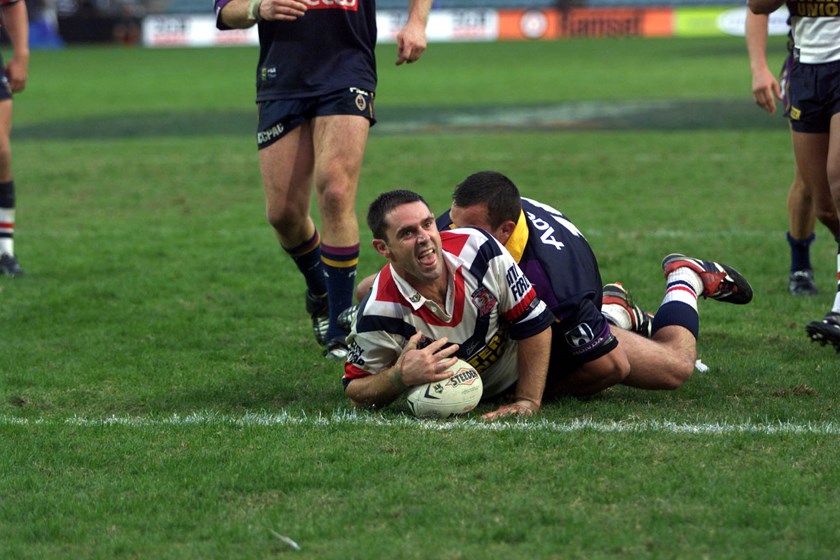 Roosters five-eighth Brad Fittler scores a try against the Storm.