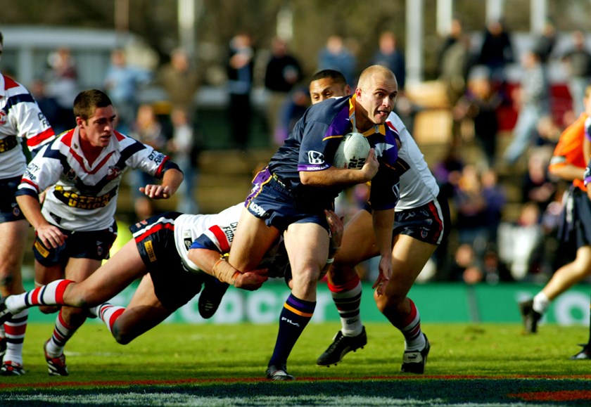 Storm forward Kirk Reynoldson takes on the Roosters defence in 2012.