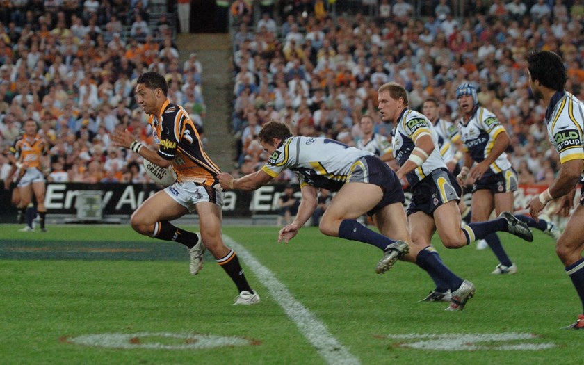 Benji Marshall leaves the Cowboys in his way during the 2005 grand final.
