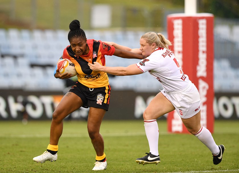 Amelia Kuk strides out for PNG at the 2017 World Cup.