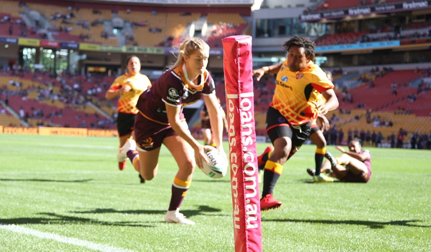 Meg Ward scores for the Broncos against PNG.
