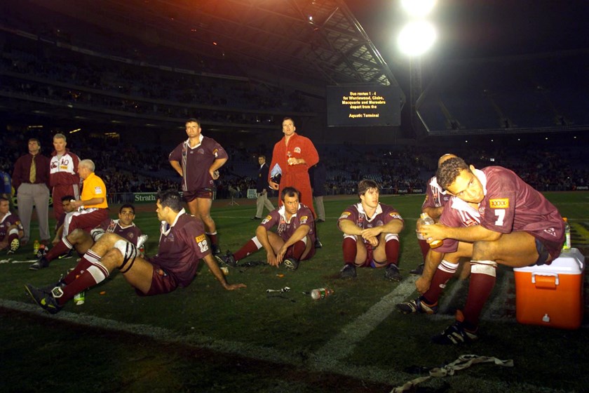 Queensland players look shattered after their Origin III loss.