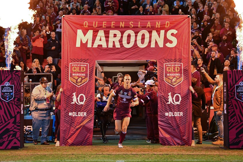Daly Cherry-Evans leads out the Maroons in the 2019 series opener.