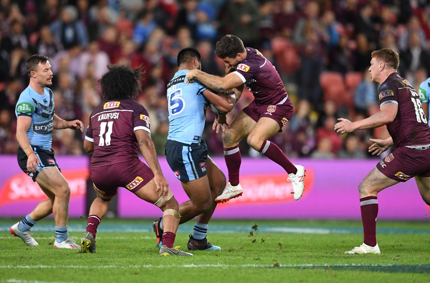 Ben Hunt tries to put the brakes on Payne Haas in Origin I