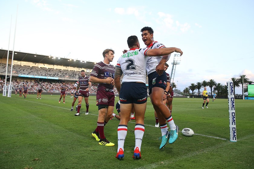 Matt Ikuvalu scores for the Roosters.
