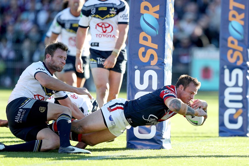 Jake Friend dives over for a try.