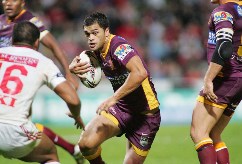Karmichael Hunt on the fly for the Broncos.