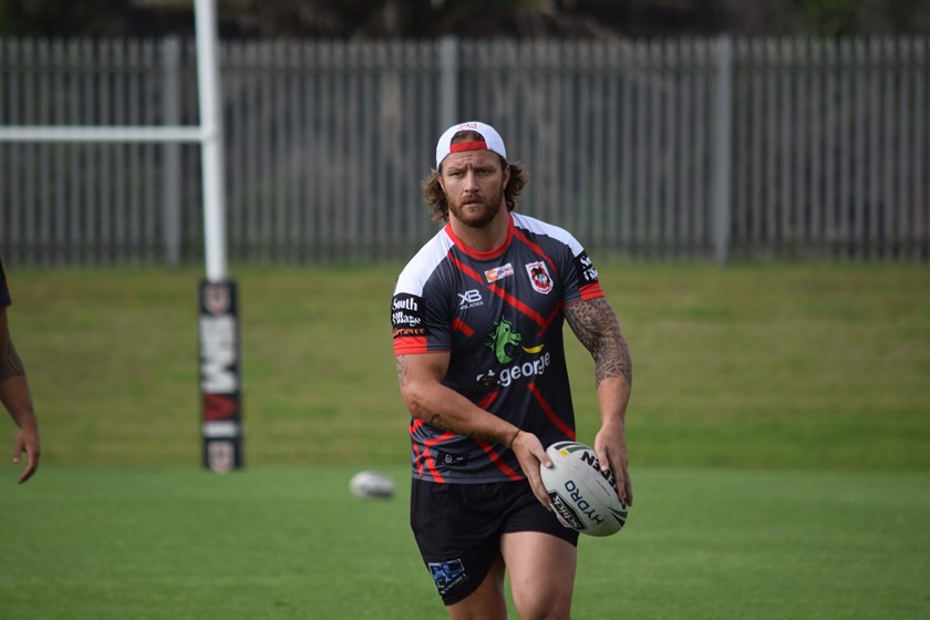 Korbin Sims training with the Dragons.