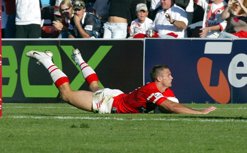 Matt Cooper scores one of his four tries for the Dragons against Penrith on April 17, 2004.