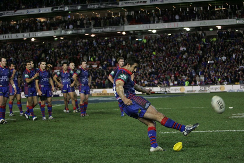 Andrew Johns kicks a goal for the Knights in 2006.