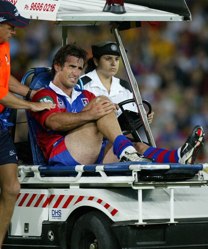 Andrew Johns suffers a serious knee injury on March 27, 2004.