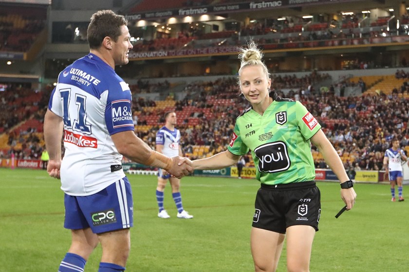 Bulldogs captain Josh Jackson congratulates Belinda Sharpe following her maiden game under the two-referee system in 2019.
