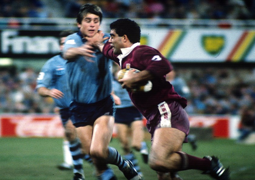 Meninga's fend keeps Chris Mortimer at bay during the 1985 Origin series.