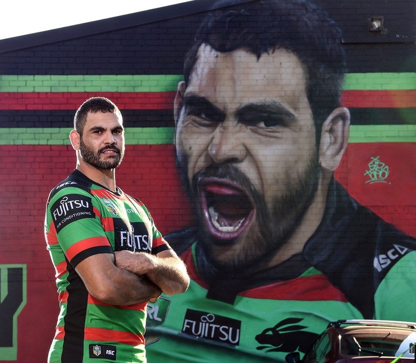 Greg Inglis and the mural bearing his image in Redfern.