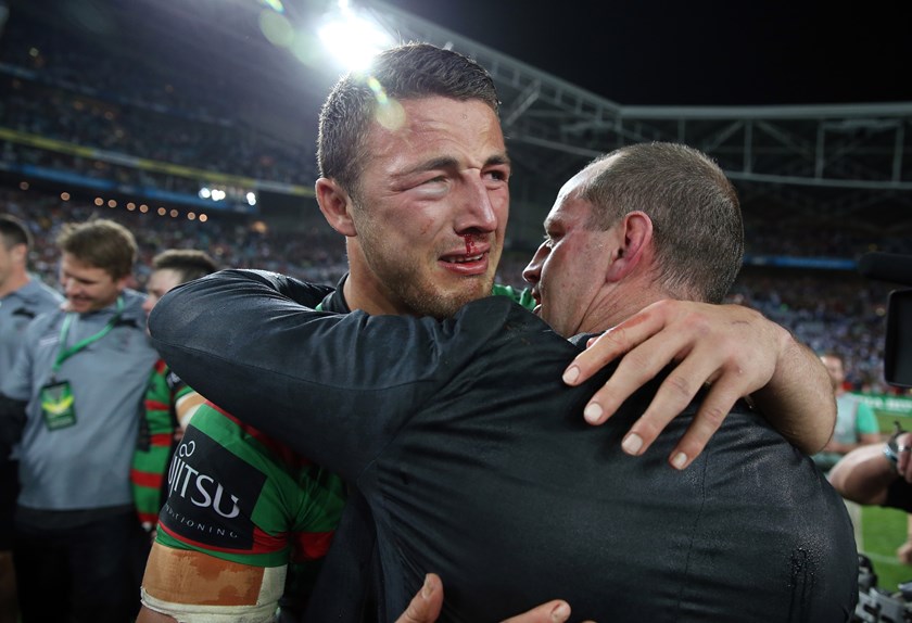 Sam Burgess with Rabbitohs coach Michael Maguire after the 2014 grand final.
