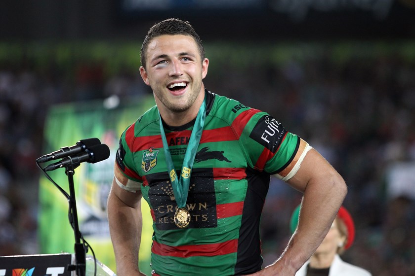 Burgess accepts his Clive Churchill Medal.