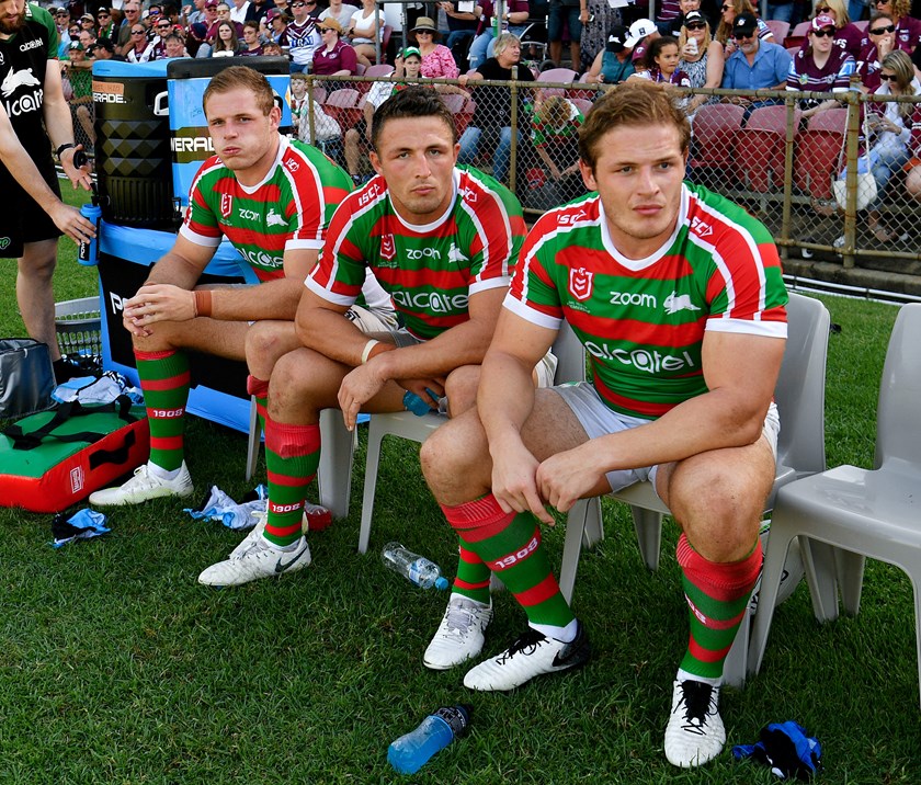 George, Sam and Tom Burgess on the bench during a Rabbitohs game in 2019.