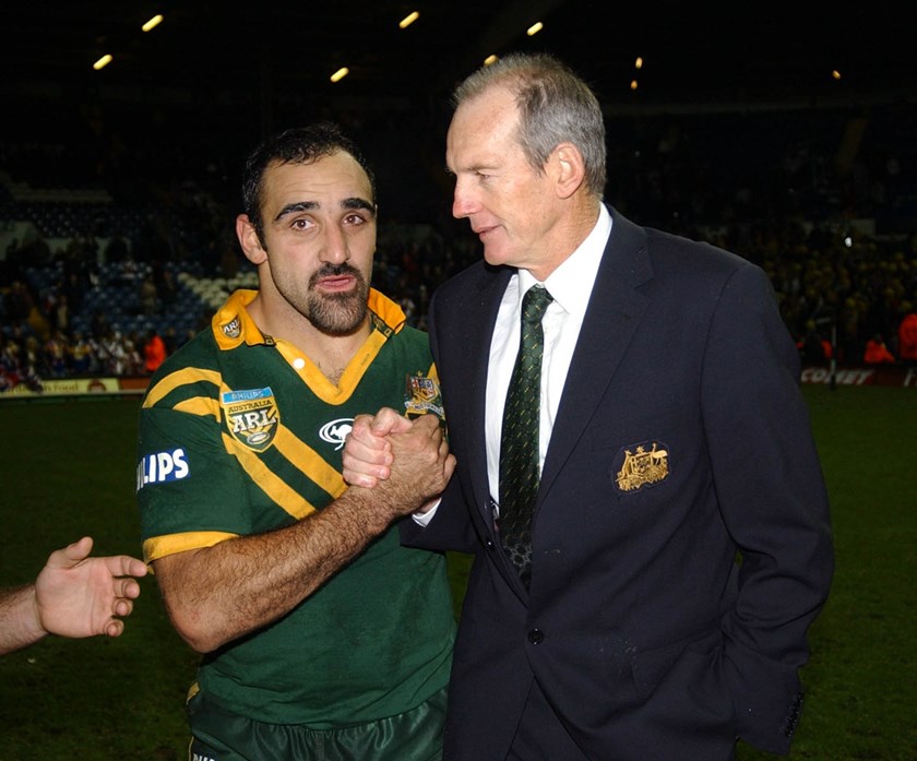 Former Broncos and Kangaroos forward Tonie Carroll with coach Wayne Bennett.