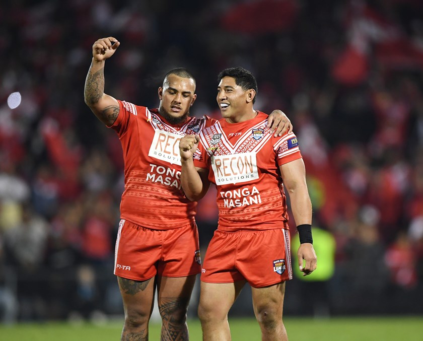 Addin Fonua-Blake (left) and Tongan teammate Jason Taumaulolo after beating Samoa in 2018.