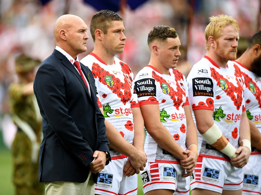 Dragons coach Paul McGregor and players at Anzac Day match