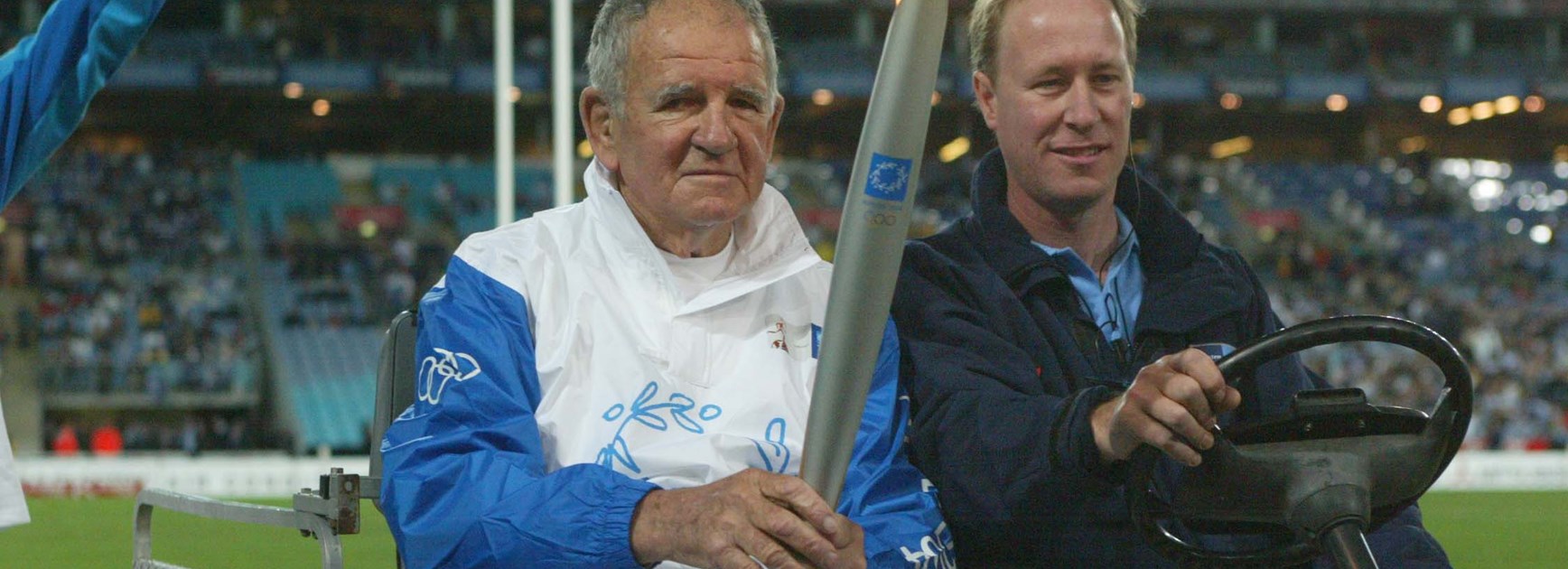 Jack Gibson with the Olympic torch in 2004.