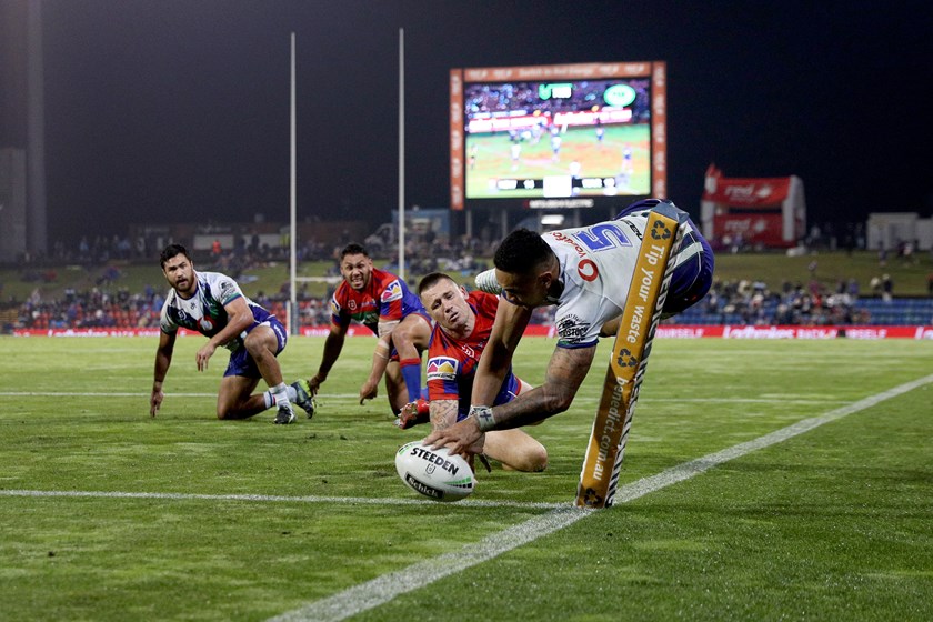 Peta Hiku looks on after putting Ken Maumalo away for a try in Newcastle.